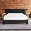 Base letto imbottita grigio scuro con piattaforma