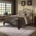 Struttura Letto Matrimoniale in Metallo con Lavorazione a Volute Decorative, Finitura Ciliegio