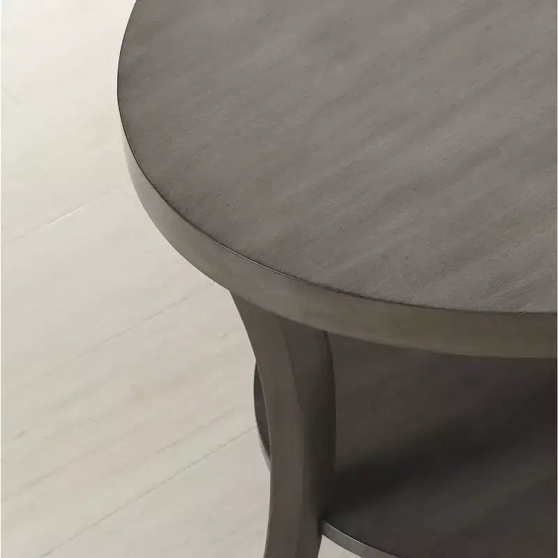 Tavolino rotondo a 2 ripiani in legno con mensola inferiore e gambe curve
